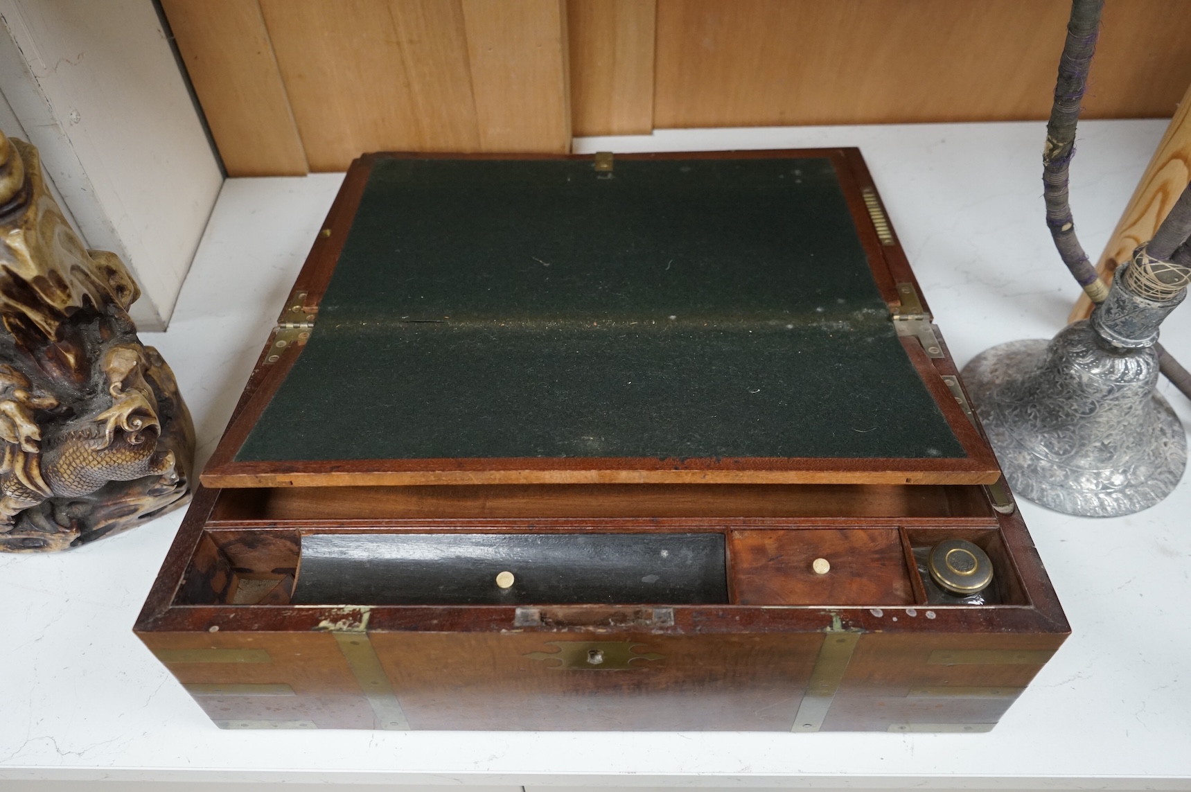 An early 19th century brass bound mahogany writing slope with maker's label for J. Allen, 45cm wide